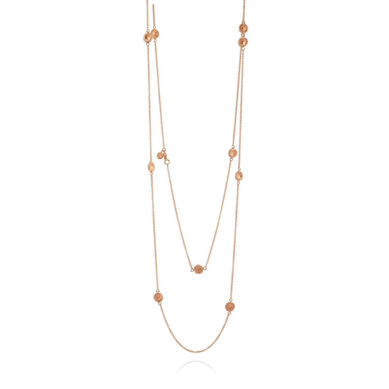 Knappkorallhalsband i roséguld på vit bakgrund